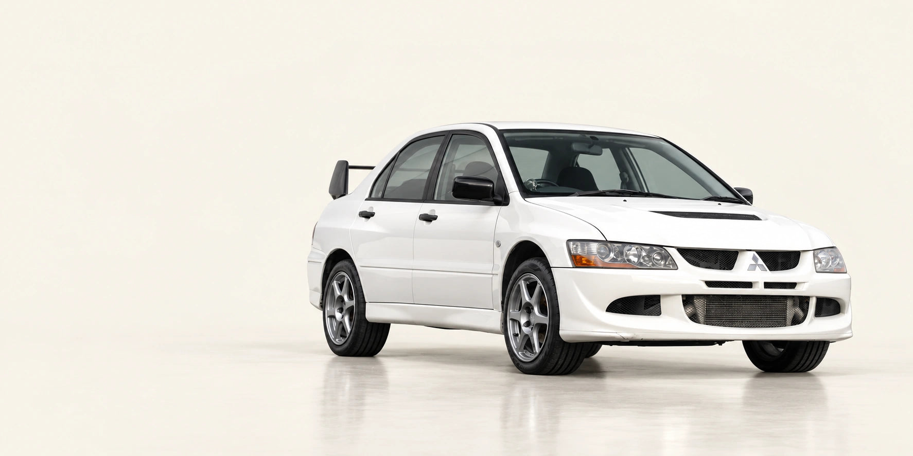 White Mitsubishi Lancer Evolution at TougeSupply